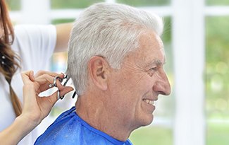 Resident getting haircut