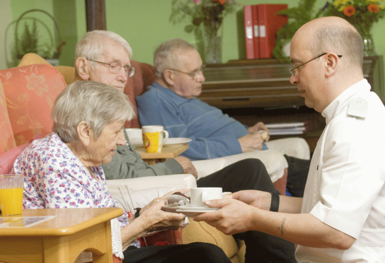 Tea and cake in the lounge with residents