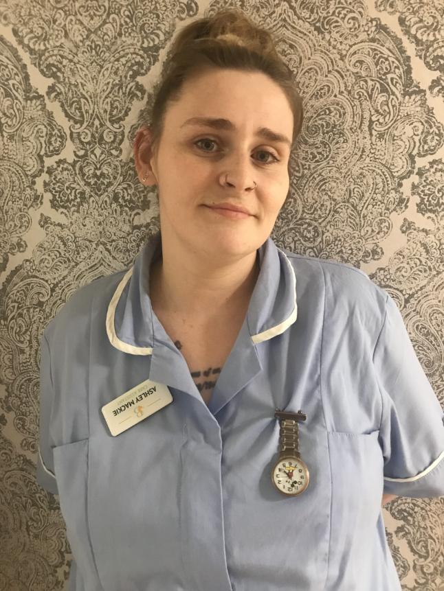 lady posing for staff photo